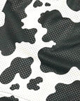 Close up of RF-Wear Men's Mesh Animal Print Shorts - Cow - Black/White