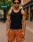 Man wearing a black tank top and RF-Wear Men's Mesh Animal Print Shorts - Tiger - Orange/Black