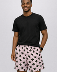 Man wearing a black t-shirt and RF-Wear Men's Mesh Butterfly Shorts in Lilac/Black
