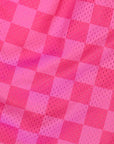 Close-up of RF-Wear Men's Mesh Checkered Shorts in Fuchsia/Pink