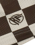 Close-up of RF-Wear Men's Mesh Checkered Shorts in Mocha/Cream with RF logo