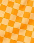 Close-up of RF-Wear Men's Mesh Checkered Shorts in Peach