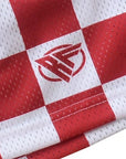 Close up of RF-Wear mesh checkered shorts in red and white with logo