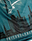 Close up of RF-Wear Men's Mesh Philadelphia Cityscape Shorts in Green/Black