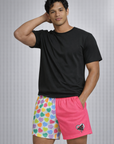 Man wearing a black t-shirt and RF-Wear Men's Mesh Split Convo Heart Shorts in Pink/Multicolor