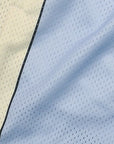 Close-up of RF-Wear Men's Mesh Cream Stripe V-Cut Shorts in Blue