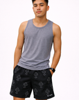 Man wearing a grey tank top and RF-Wear Men's Mesh Cross 3.0 Shorts in Black/Grey