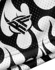 Close-up of RF-Wear Men's Mesh Flame Shorts in White/Black with RF logo