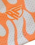 Close-up of RF-Wear Men's Mesh Flame Shorts in White/Orange with RF logo