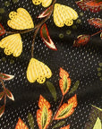 Close-up of RF-Wear Men's Mesh Floral Shorts in Black/Orange/Yellow