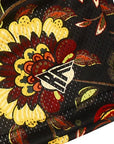 Close-up of RF-Wear Men's Mesh Floral Shorts in Black/Orange/Yellow with RF logo