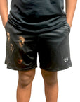 Man wearing RF-Wear Men's Mesh Horror Squad Shorts in Black