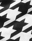 Close-up of RF-Wear Men's Mesh Houndstooth Shorts in Black/White
