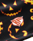 Close-up of RF-Wear Men's Mesh Jack-O-Lantern 2.0 Shorts in Black/Orange with RF logo