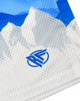 Close-up of RF-Wear Men's Mesh Mountain Skyline Shorts in Blue/White with RF logo