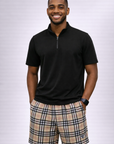 Man wearing a short sleeve black quarter zip top and RF-Wear Men's Mesh Tartan Plaid Shorts in Tan/Black