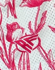 Close-up of RF-Wear Men's Mesh Floral Porcelain Shorts in White/ Fuchsia with RF logo
