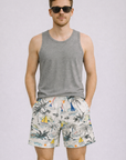 Man wearing a grey tank top and RF-Wear Men's Mesh Sail Boats Shorts in White/Multicolor