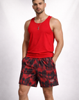 Man wearing a red tank top and RF-Wear Men's Mesh Skull Shorts 2.0 in Black/Red