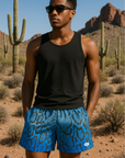 Man wearing a black tank top and RF-Wear Men's Mesh Snakeskin Shorts in Blue