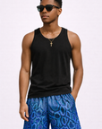 Man wearing a black tank top and RF-Wear Men's Mesh Snakeskin Shorts in Blue