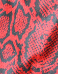 Close-up of RF-Wear Men's Mesh Snakeskin Shorts in Red
