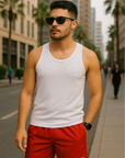 Man wearing white tank top and RF-Wear Men's Mesh Solid Color Shorts in Red