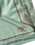 Close-up of RF-Wear Men's Mesh Split Porcelain on the Side Shorts in Seacrest/Incense with RF logo