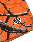 Close-up of RF-Wear Men's Mesh Tree Camo Shorts in Orange with RF logo