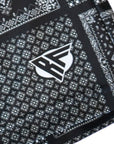 Close-up of RF-Wear Men's Bandana Patchwork Shorts in Black with RF logo