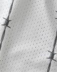 Close-up of RF-Wear Men's Reflective Logo Barbed Wire Shorts in White