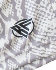 Close-up of RF-Wear Men's Snakeskin Shorts in Cream/Grey with RF logo
