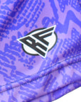 Close-up of RF-Wear Men's Snakeskin Shorts in Purple with RF logo