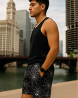 Man wearing a black tank top and RF-Wear Men's Spider Web Shorts in Black