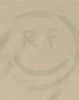 Close-up Graphic of RF-Wear Plaid Smile Hoodie in Sand