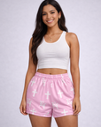 Woman in a white crop tank top and RF-Wear Women's Cross Shorts in Pink