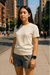 RF Wear Unisex Solid Color Short Sleeve T-Shirt - Ivory - Female Model Front View