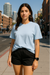 RF Wear Unisex Solid Color Short Sleeve T-Shirt - Sky Blue - Female Model Front View