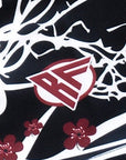 Close-up of RF-Wear Swim Trunks - Blossom (Lined) in Black/White with RF logo