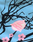 Close-up of RF-Wear Swim Trunks - Blossom (Lined) in Sky Blue with RF logo