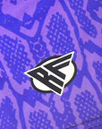Close-up of RF-Wear Swim Trunks -Snakeskin (Lined) in Purple with RF logo