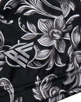 Close-up of RF-Wear Women's Baroque Shorts in Black with RF logo