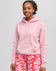 Woman wearing a soft pink hoodie and RF-Wear Women's Camo Shorts in Pink/Red