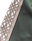 Close-up of RF-Wear Women's Celtic Cross Trim Shorts in Pine Green