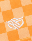 Close-up of RF-Wear Women's Checkered Shorts in Peach with RF logo