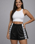 Woman wearing RF-Wear Women's Cross Trim Shorts in Black