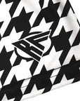 Close-up of RF-Wear Women's Houndstooth Shorts in Black/White with RF Logo