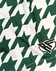 Close-up of women's RF-Wear Women's Houndstooth Shorts - Green/White with RF logo