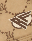 Close-up of RF-Wear Women's Monogram Shorts in Tan with RF logo