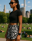 Woman at the park wearing RF-Wear Women's Paisley 2.0 Shorts - Black/White - Side View